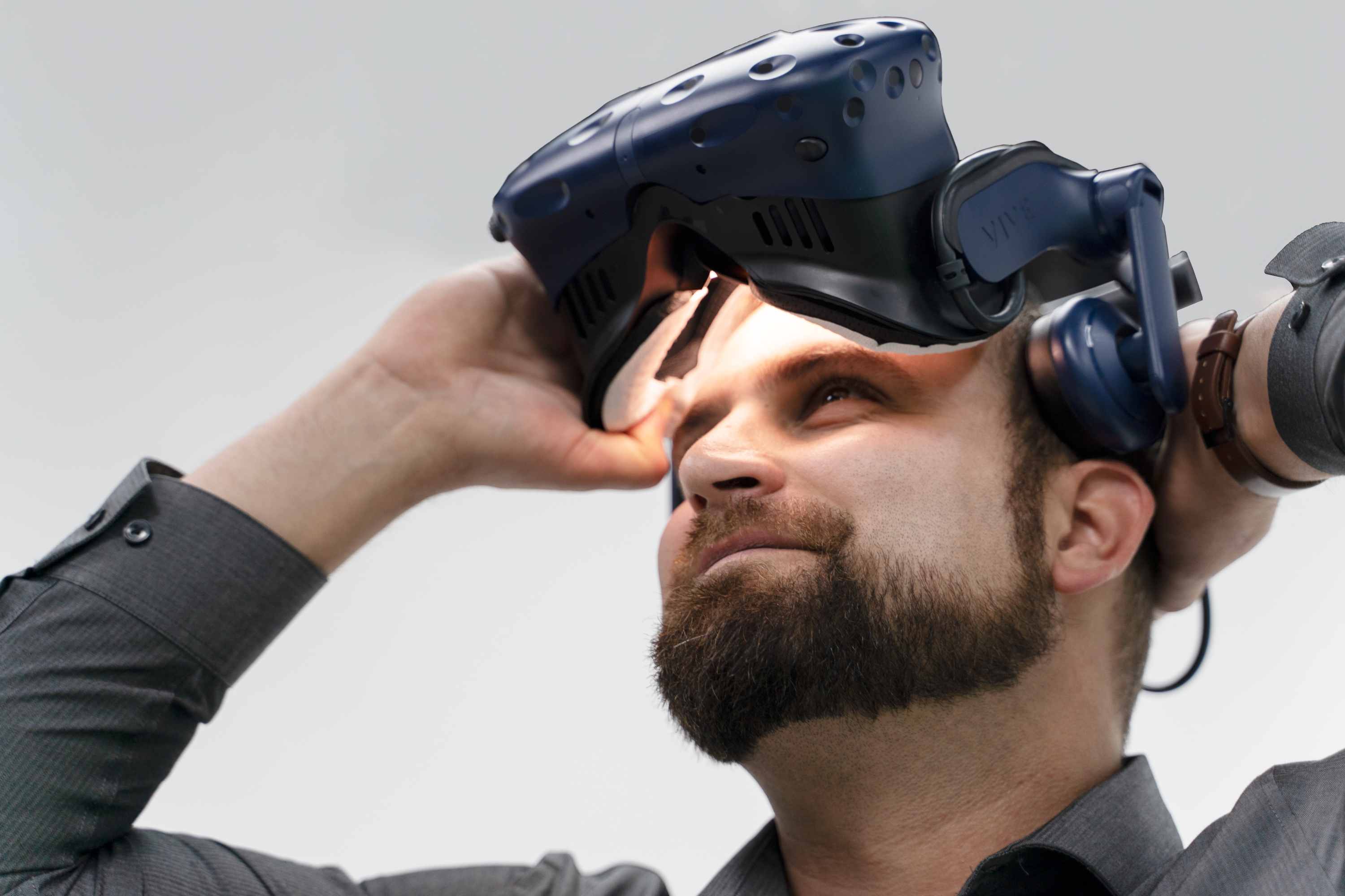 Man putting on a VR headset